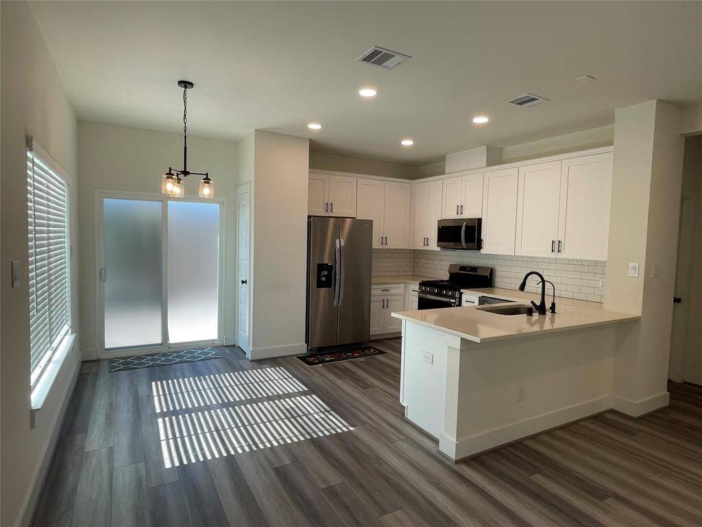 Spacious Dining and Modular Kitchen Combo with all appliances.