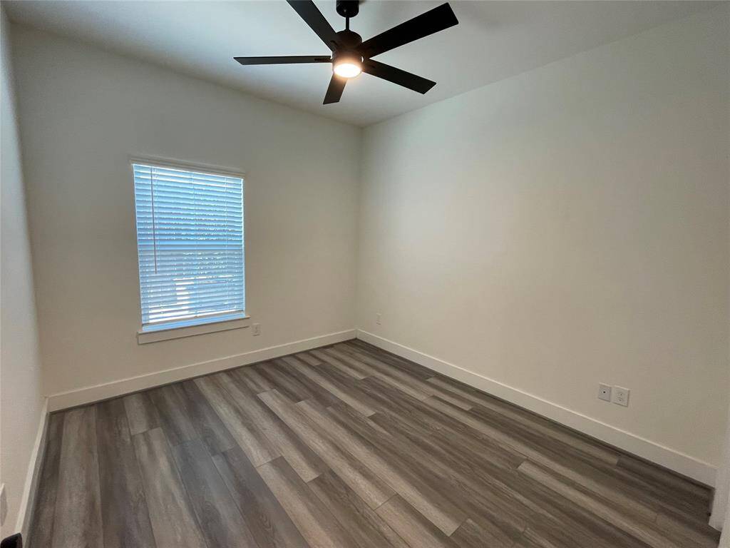 Mother-in-Law Bedroom on floor one with full bah with standing shower.
