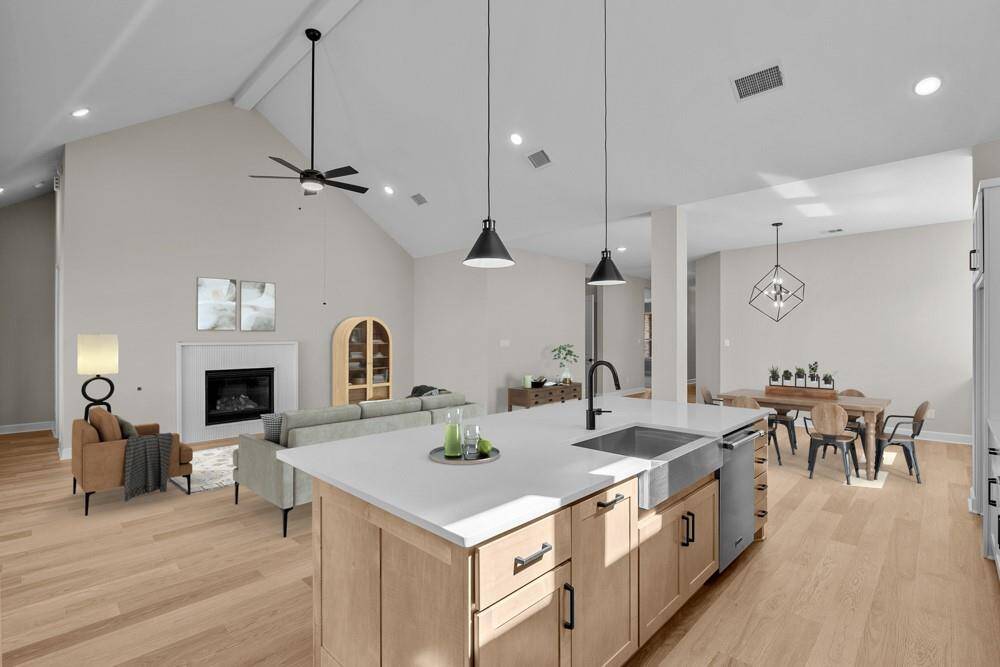 EXAMPLE PHOTO: Open design with cathedral ceiling at living and Kitchen gives this home a unique feel!