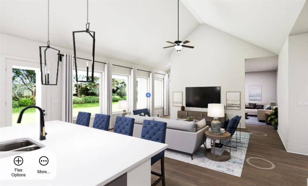 EXAMPLE PHOTO:  The big picture windows bring the outside in!  Lots of room for relaxing after a long day!