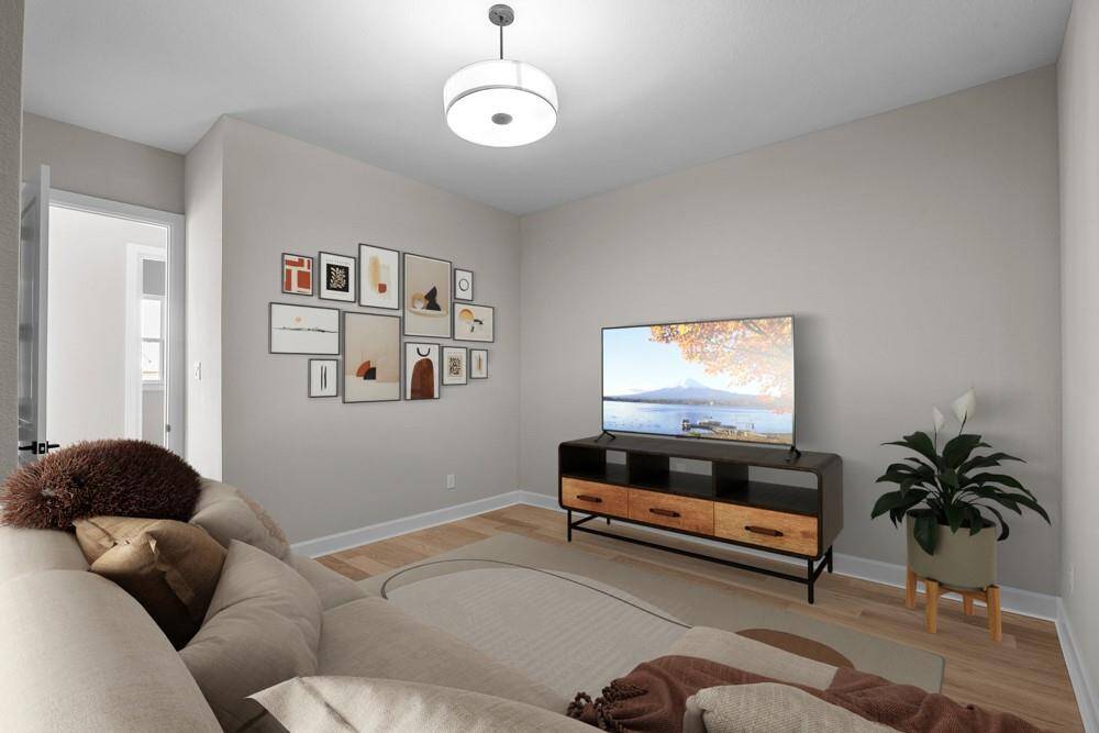 EXAMPLE PHOTO: TV room/gameroom is a great place to hang with the family or it could be used as a kids play room or workout room!