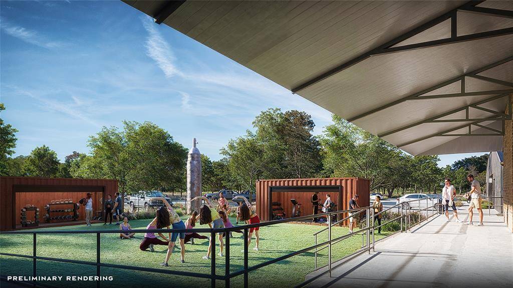 Outdoor green space at the Iron Yard Gym