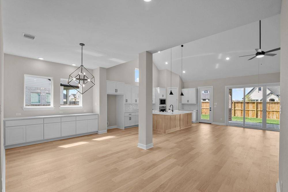 EXAMPLE PHOTO:  Another view of Kitchen and Dining with LOTS of cabinets!