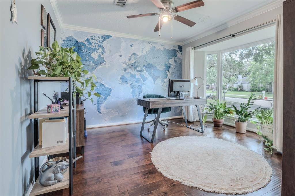 Located on the 1st level for convenience and privacy, this dedicated office or study offers the ideal space for remote work, reading, or quiet focus
