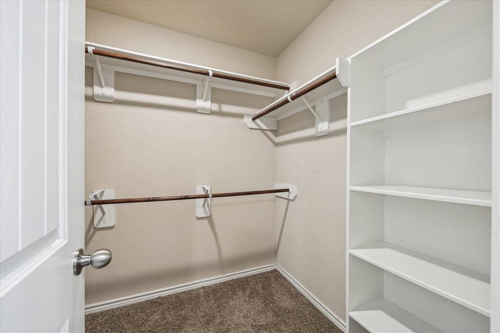Large walk in closet in master bedroom
