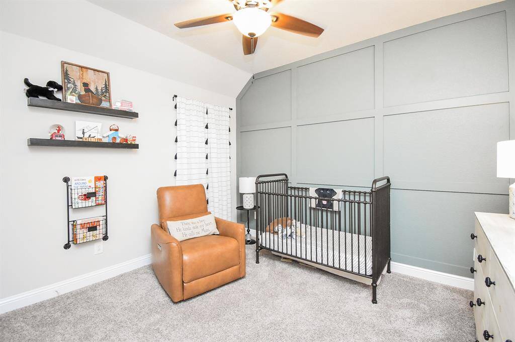 The third bedroom has a wall feature that sets it apart. Great wall space for nursery as seen or for larger beds.