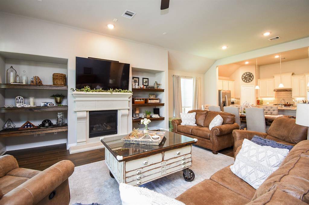 Windows looking out to the backyard bring plenty of natural light into the room.
