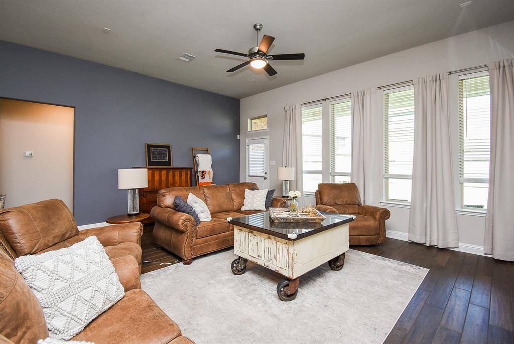 A view showing the integration with the dining area and the kitchen. Great flow for everyday living and entertaining.