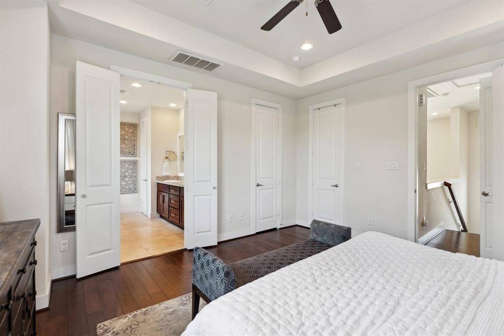 The primary bedroom with ensuite bath.