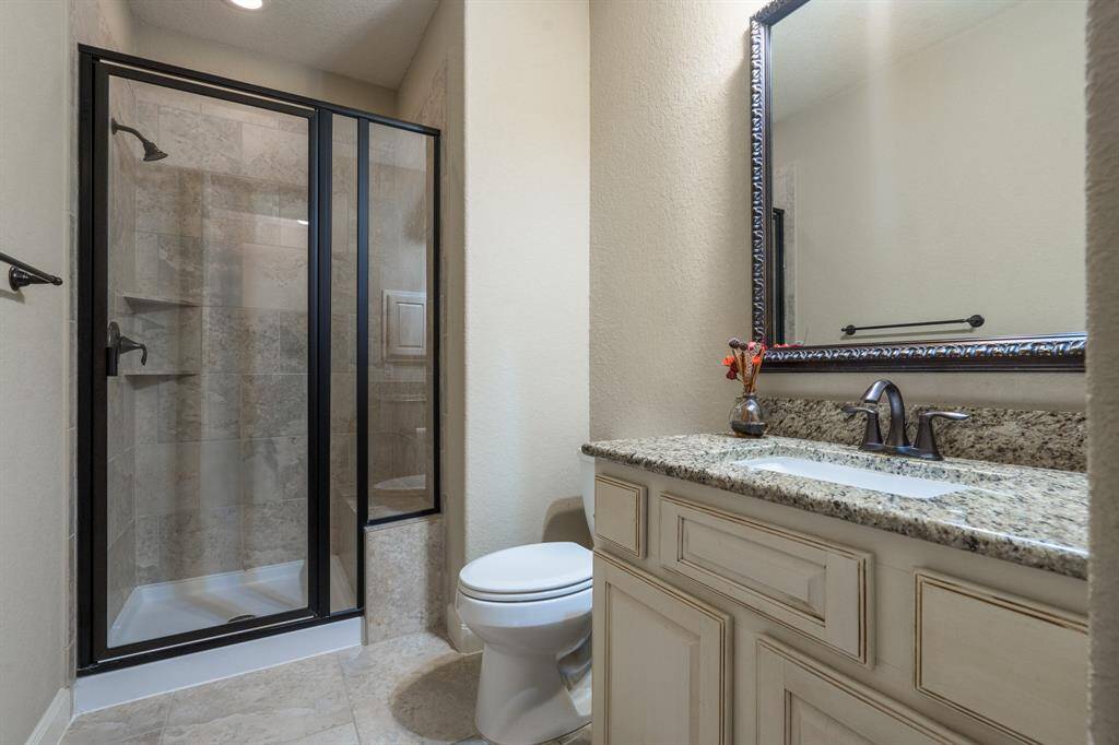 2nd bedroom with large walk in closet and brand new carpet.