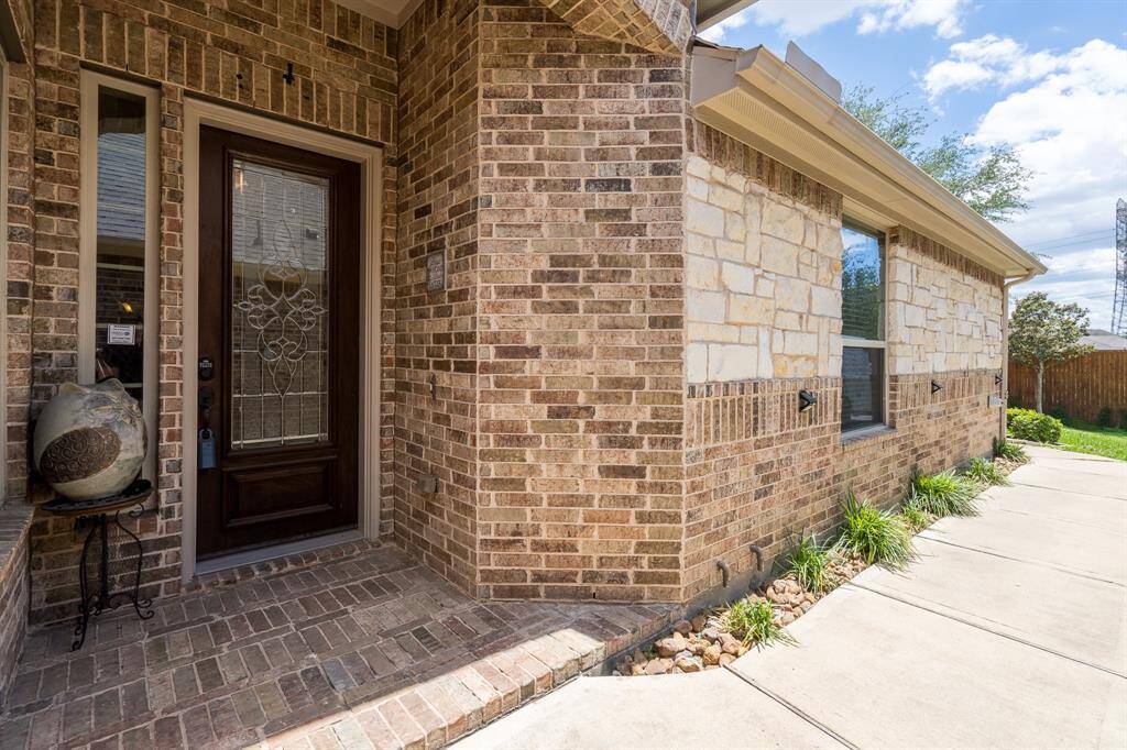 Side front door covered entrance.