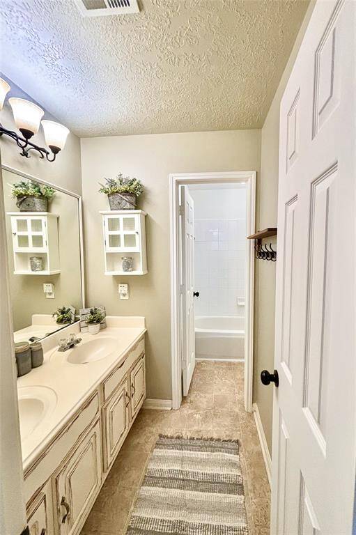 Upstairs bathroom with room for all