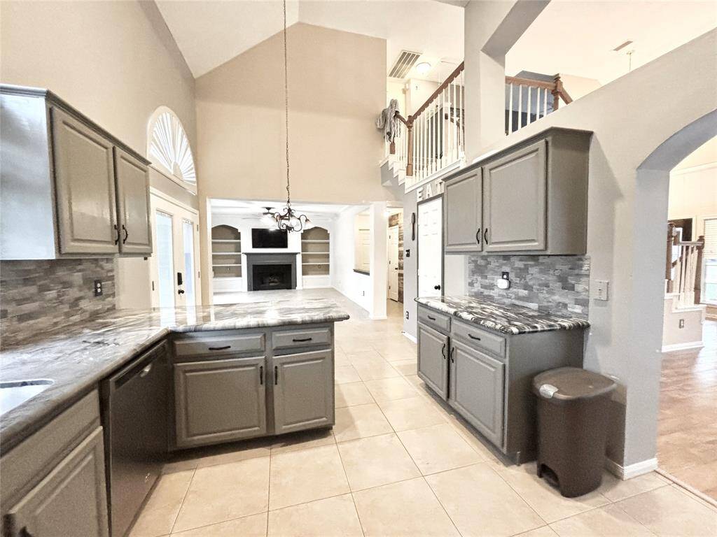 Granite countertops provide the focal point of the kitchen