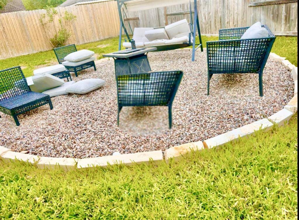 Sitting area in backyard - outdoor furniture included