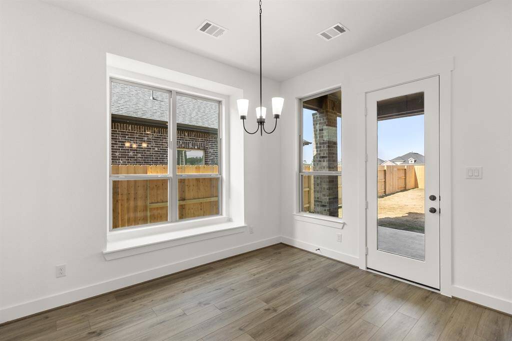 The open layout invites laughter and warmth, making it the perfect backdrop for family gatherings or cozy brunches with friends.