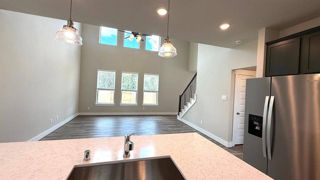 The open layout invites laughter and warmth, making it the perfect backdrop for family gatherings or cozy brunches with friends.