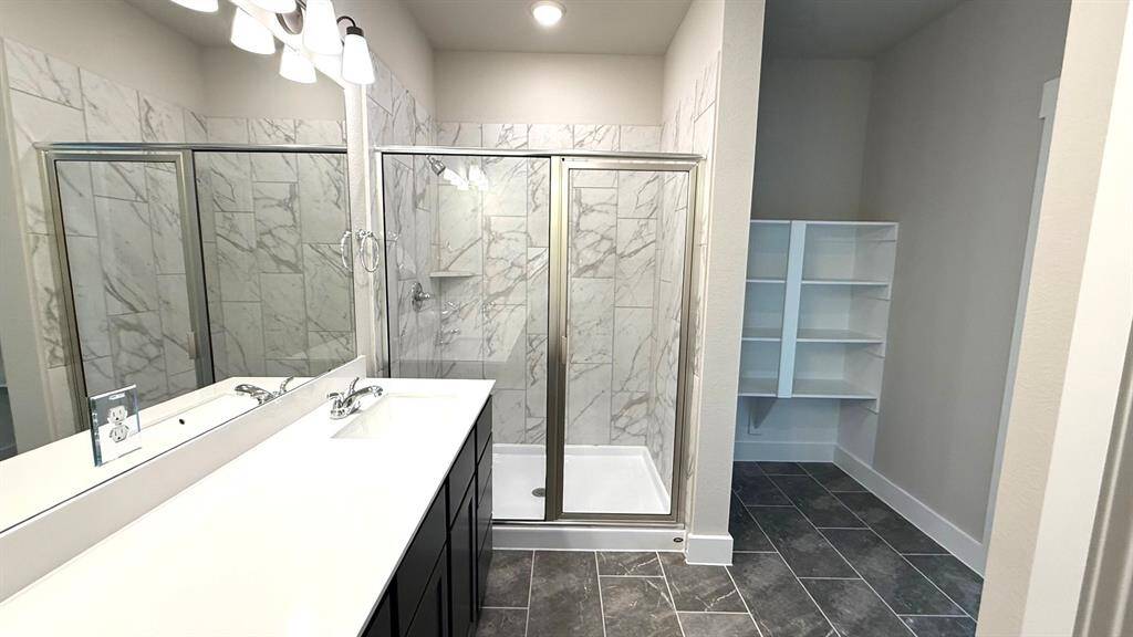 Rinse off the stresses of your day in this oversized shower.
