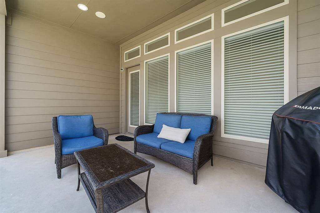 Covered back patio is great for outdoor BBQ's