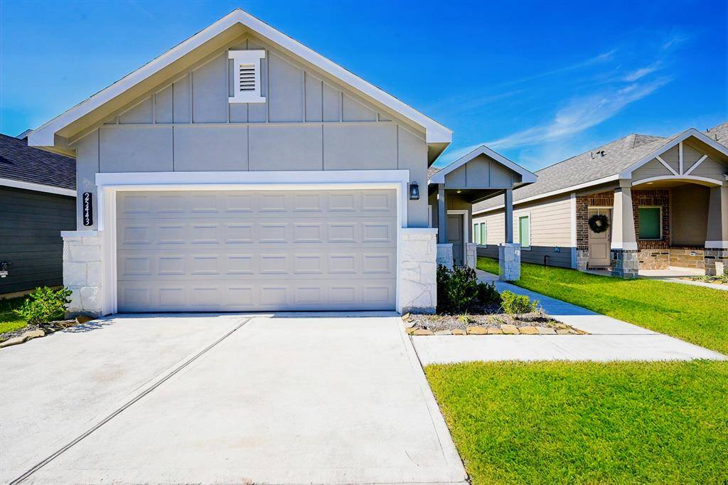 Just comfortably pull right into the dual-vehicle attached garage above a spacious, roomy driveway.