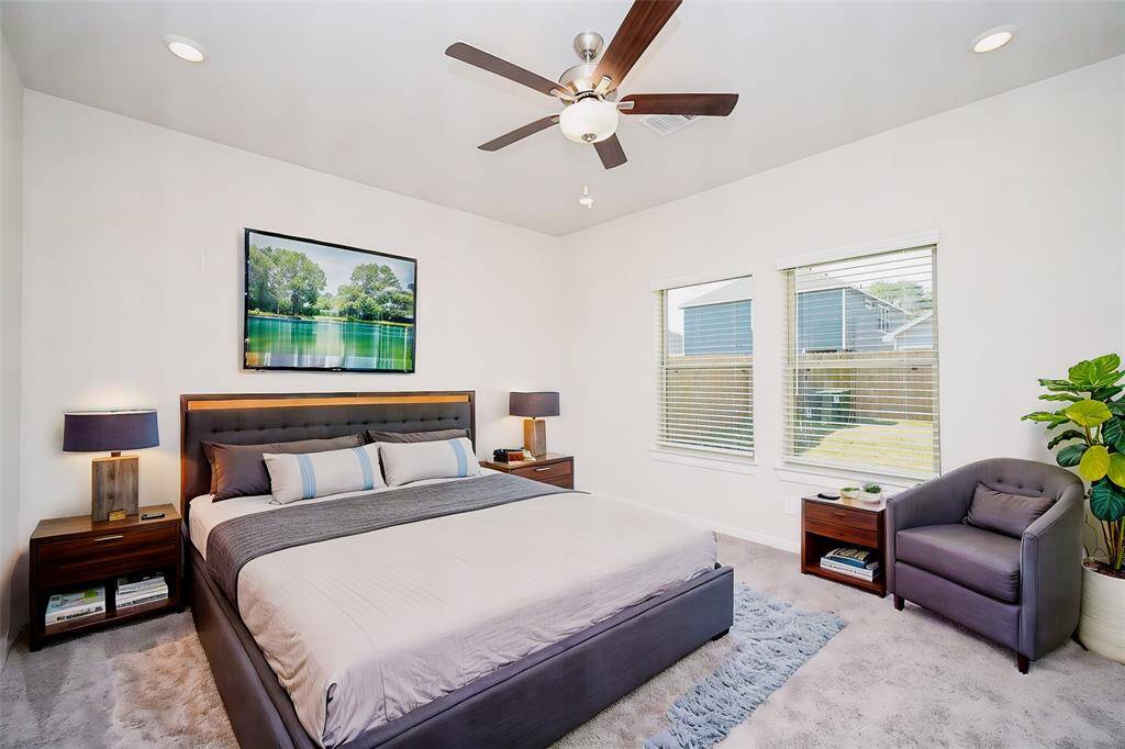 Sheer, streamlined elegance defines your huge primary suite.