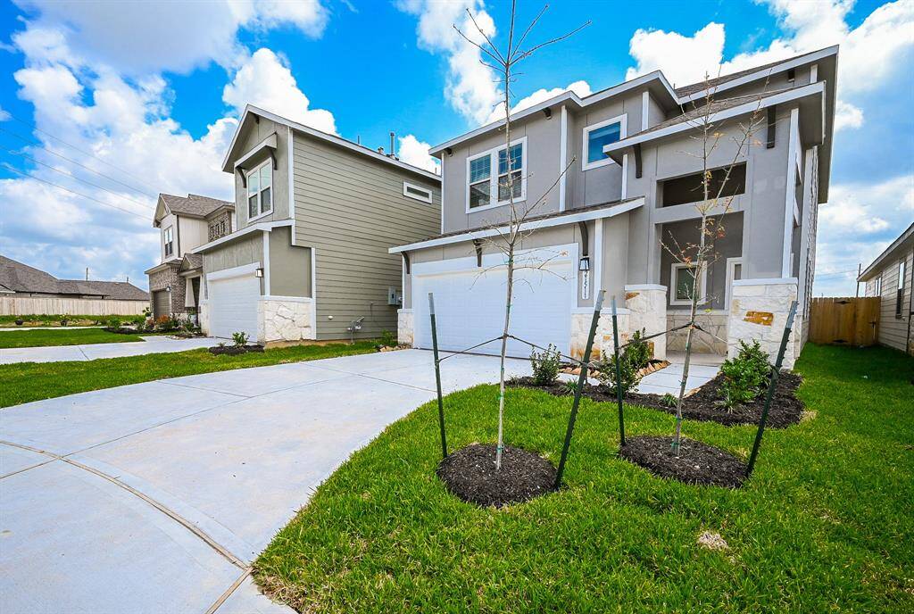Your private attached dual-car garage sits below, with easy access in and out!