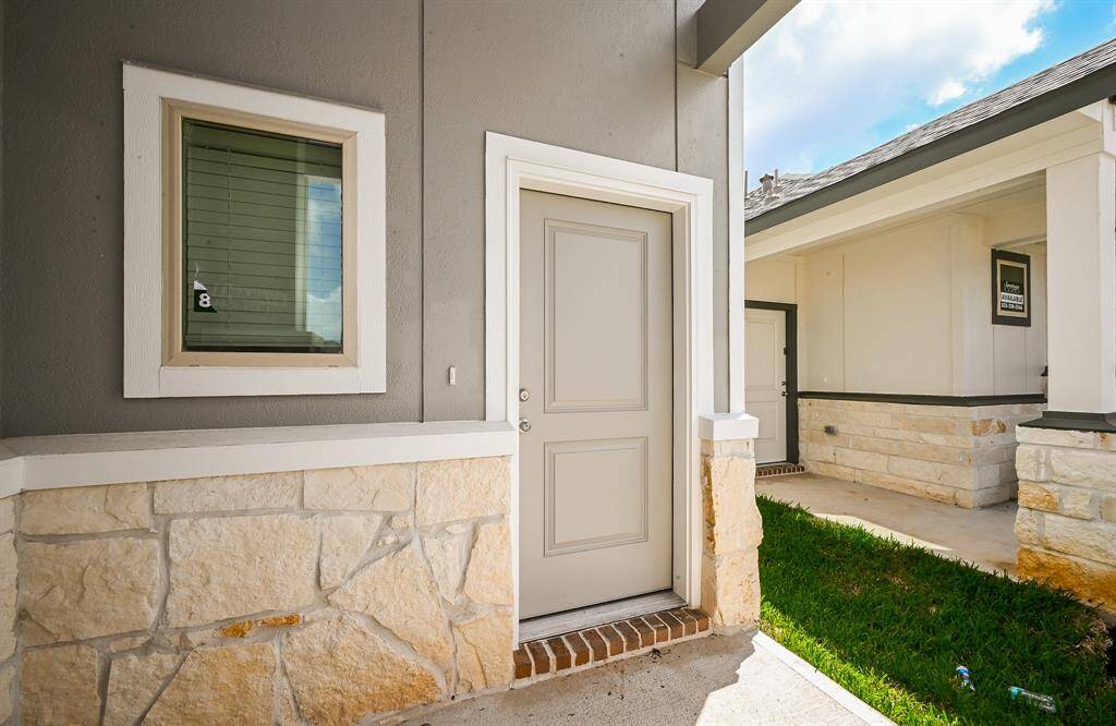 This home features a covered porch as well.