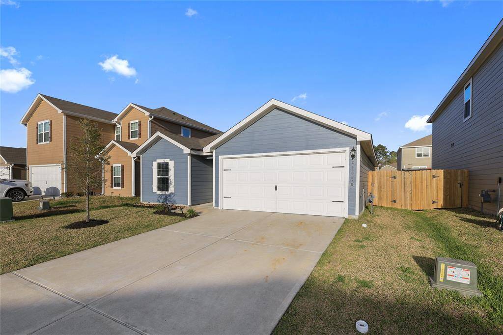 Welcome home to 22055 Ellison Drive! Charming single-story home, features a spacious two-car garage, and a welcoming front door with decorative wreath. Ideal for comfortable living.