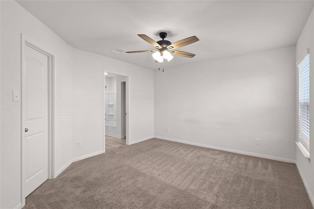 Primary Suite with ensuite bathroom.