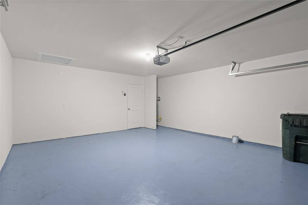 View of garage. Very spacious with epoxy floors!