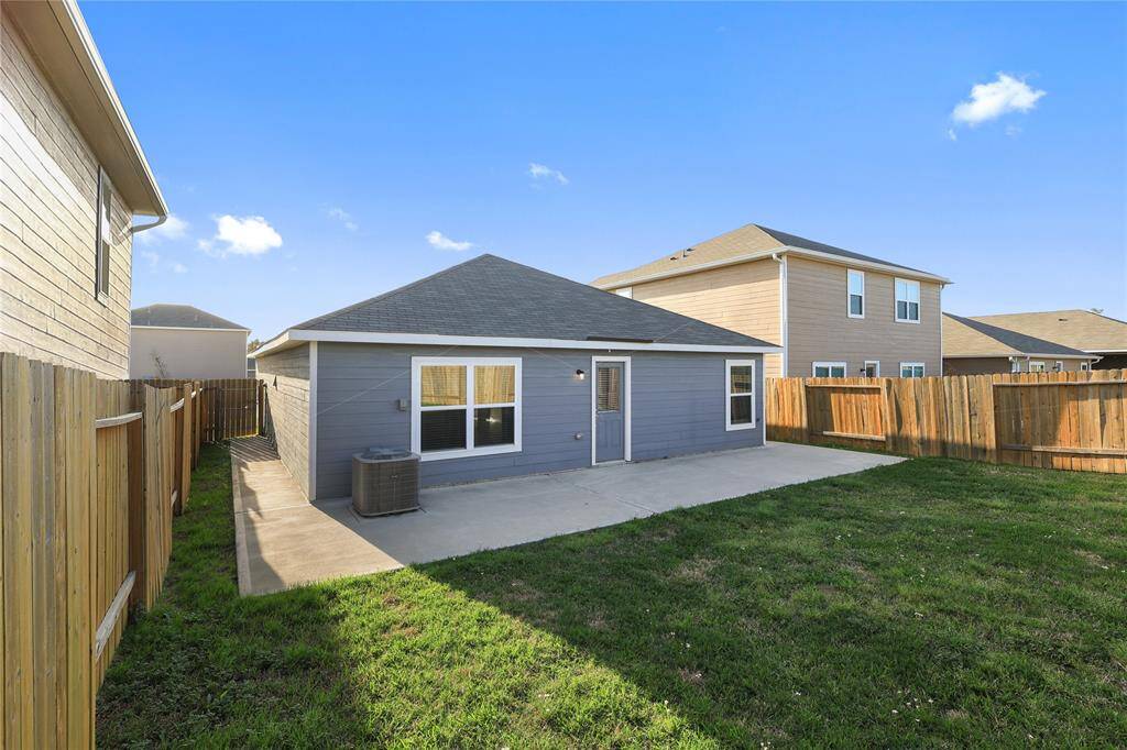 Backyard with oversized patio slab! Love to entertain? This is the house!