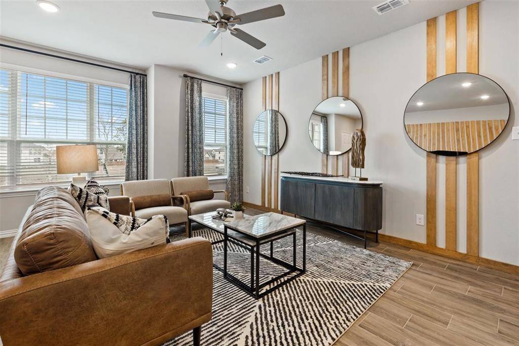 Representative photo of the Crockett floorplan by History Maker Homes, living room area, approximate completion date is June 2025