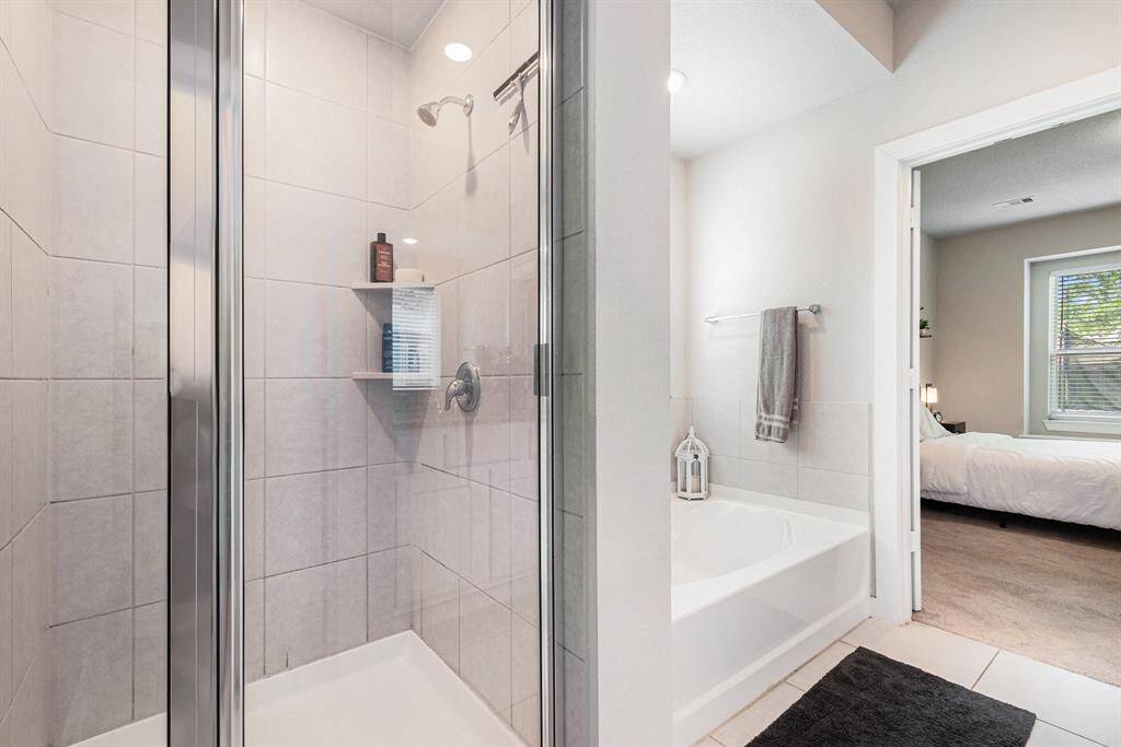 Primary bathroom with large soaking tub and shower
