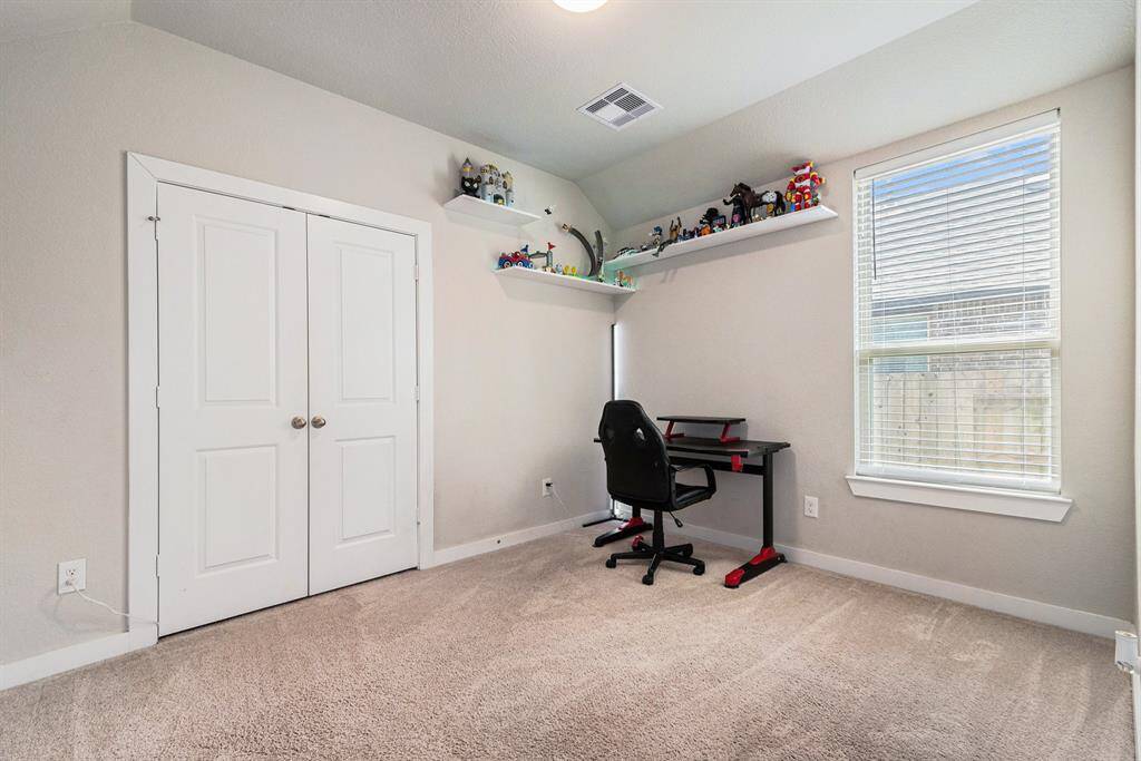 Downstairs bedroom which could also double as an office.