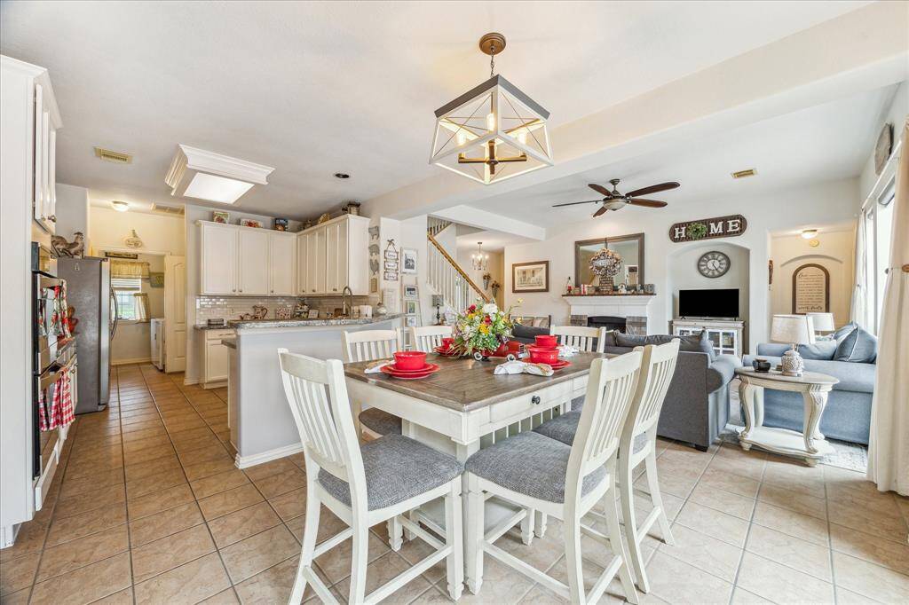 Breakfast Room is situated perfectly off the Kitchen.  It opens to the Family Room and overlooks a Stunning Resort Style Backyard!!!!