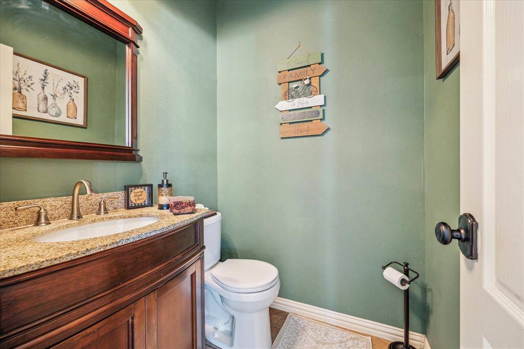 The 1st floor Powder Room is Spacious and Stunning!