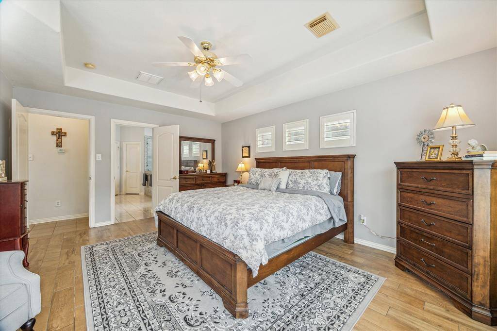 View of the Master Suite Featuring its Spacious Floor Plan leading to the En-Suite Bath.  Such a great place to take a step away from the stress of any day!!!!