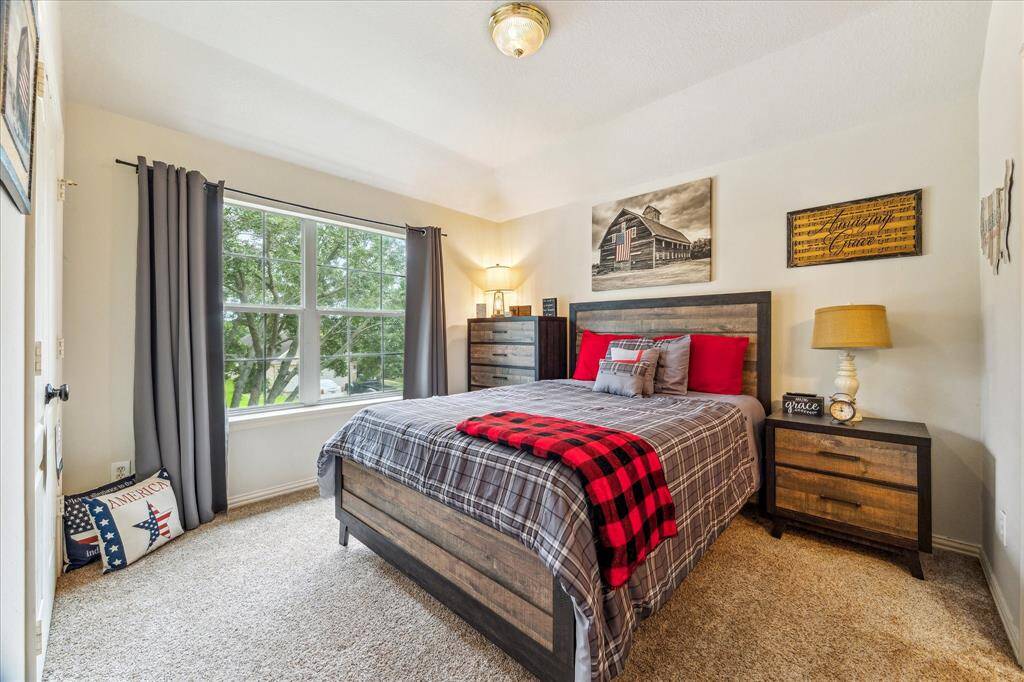 The First of Three Spacious Secondary Bedrooms.  Fabulous Large Window allows for Great Natural Lighting.  All Three Secondary Bedrooms Feature Large Closets with Plenty of Storage.  Carpet replaced in 2022!!!