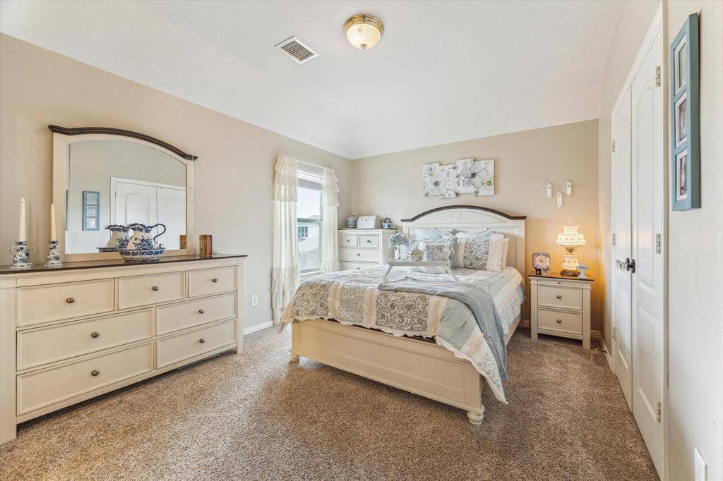 The Second of the Three Secondary Bedrooms is equally as Spacious and Updated!  Fabulous Large Window allows for Great Natural Lighting.  All Three Secondary Bedrooms Feature Large Closets with Plenty of Storage.  Carpet replaced in 2022!!!