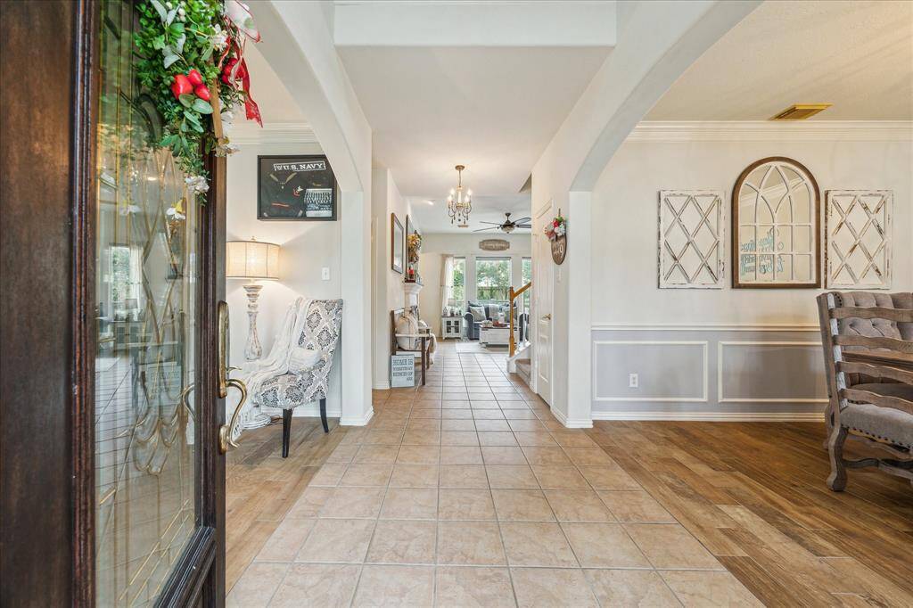 Stunning Entry!!! The Foyer opens to the Home Office, Dining Room and Family Room.