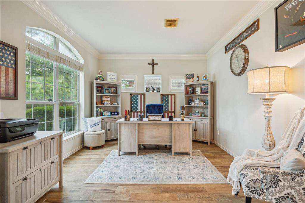 Spacious Home Office with Beautifully upgraded Wood Grain Tile Flooring, Crown Molding and Arched Windows ~ Abundance of Natural Lighting.
