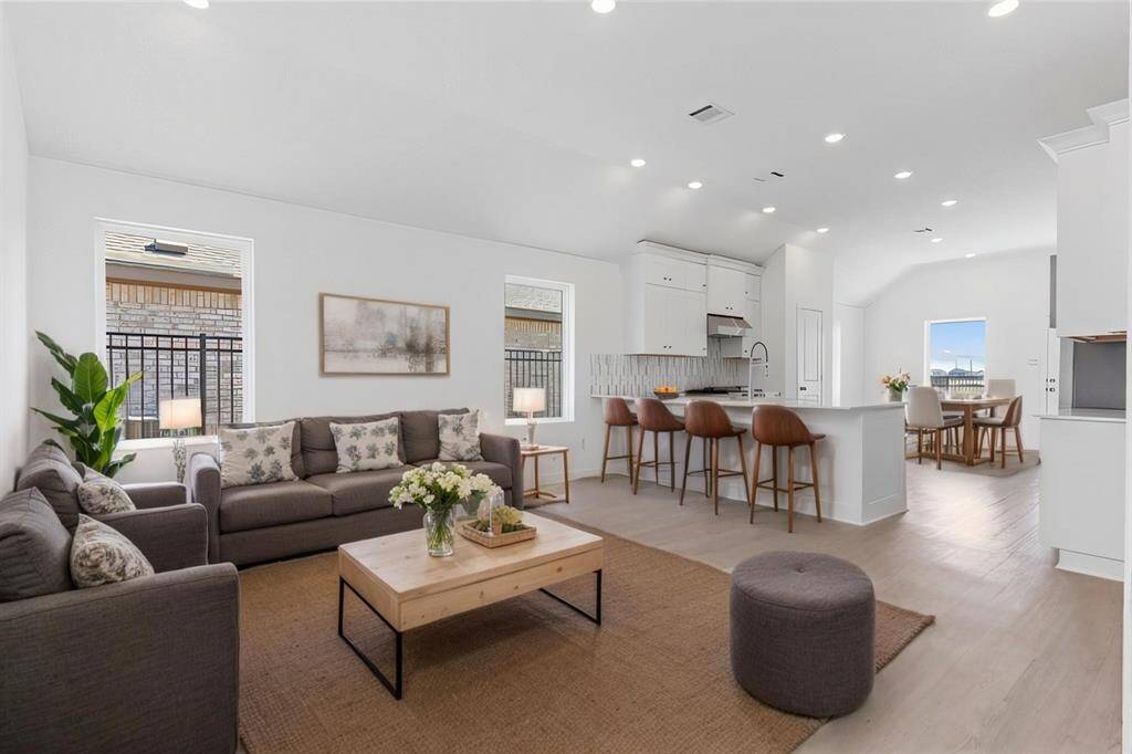 Look how amazing this home can be!  Open and flows into the gourmet kitchen and the casual dining area.  **Photo is Virtually Staged**
