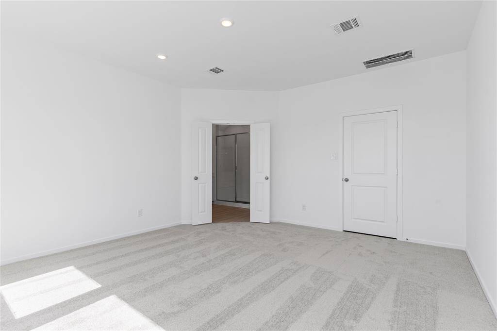 French doors open to your spa bathroom made for two!