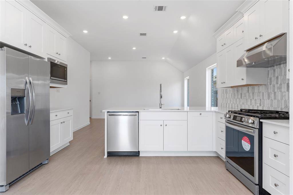 Wow, one more look at this amazing gourmet kitchen!  Notice how large that oven is for all those family and friends gathering for your cooking needs!
