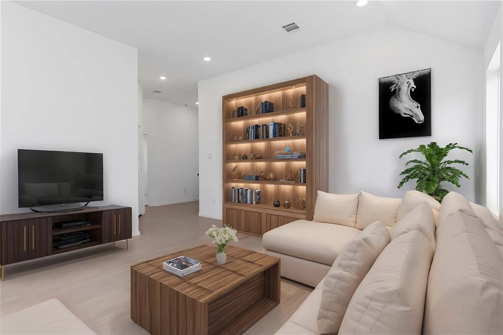 Down the hallway the guest bedrooms also tucked away for their privacy also!  **Photo is Virtually Staged**
