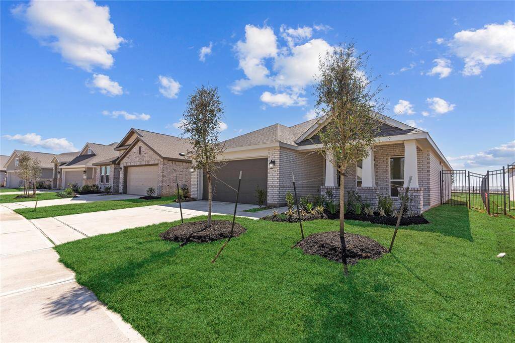 All Brick Home with garage door opener, coach lights, sprinkler system and more!