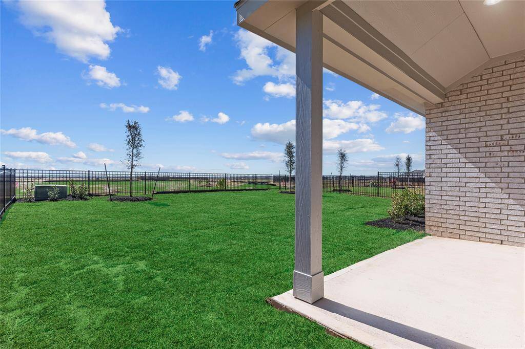 Enjoy that lake view!  Sprinkler system for carefree watering!