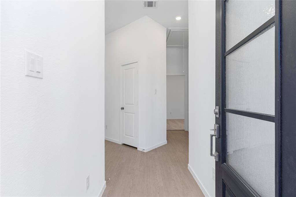 Open the door to your New Home today!  Notice that stunning frost glass tall mahogany door!