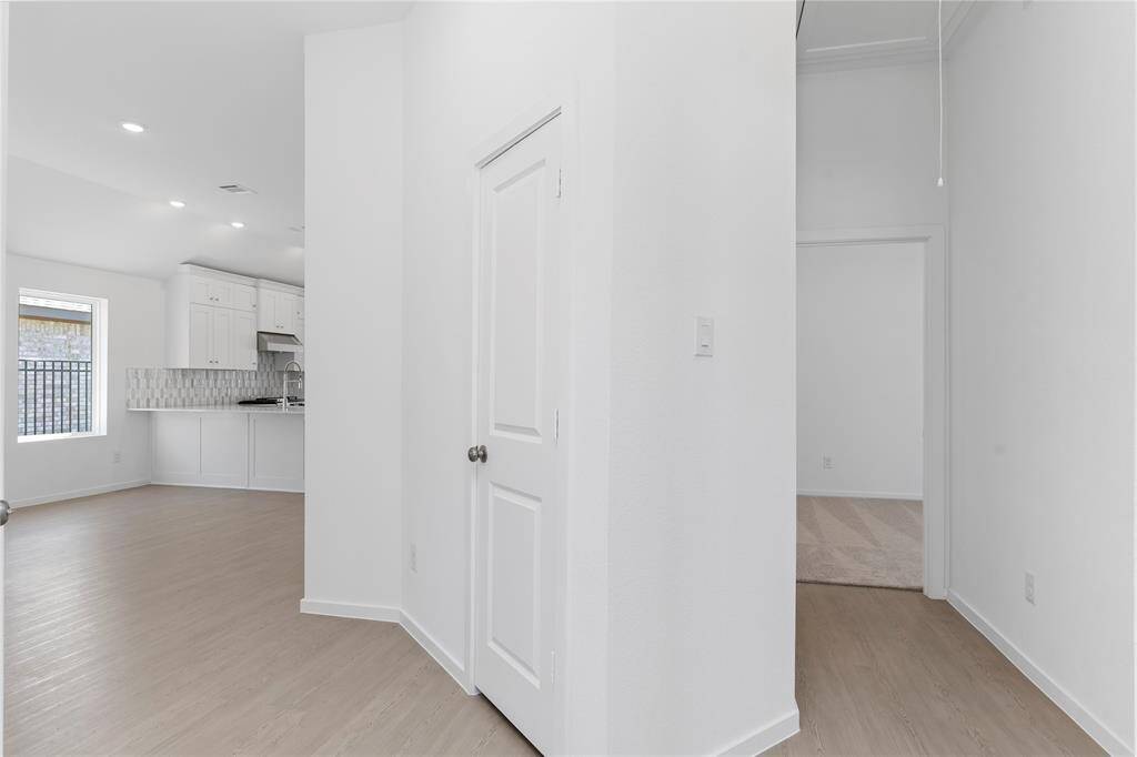 Carefree gorgeous floors throughout the main living area and hallways!  Wait till you see the amazing lake view this new home has!