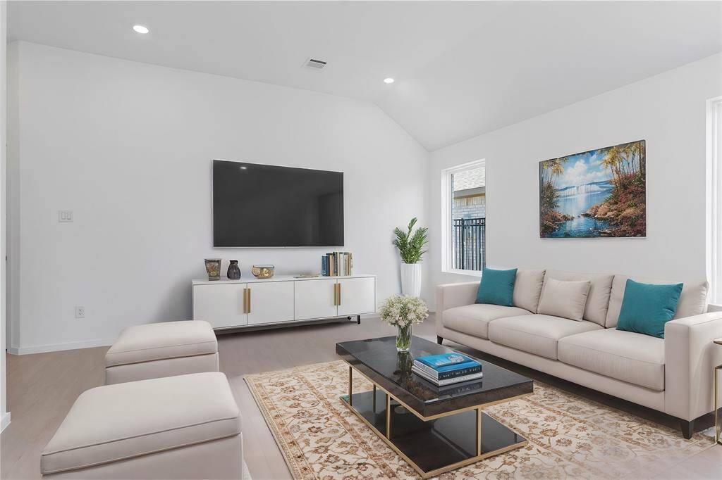 Huge Family Area with high ceilings!  **Photo is Virtually Staged**