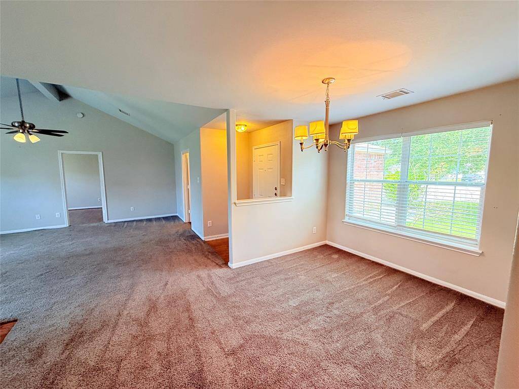 Dining room looking into living room